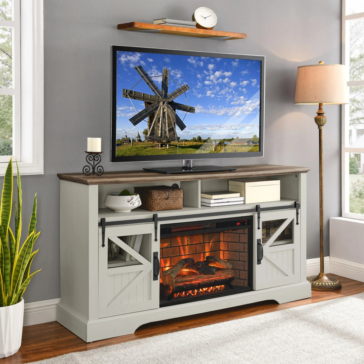 Electric fireplace TV unit with adjustable flame brightness
