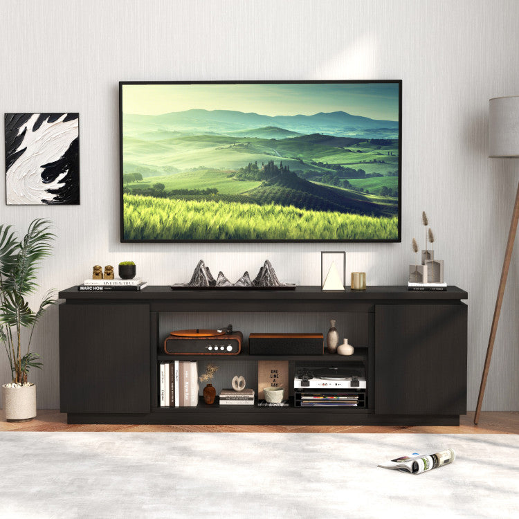 Open and closed storage in TV cabinet with fireplace feature