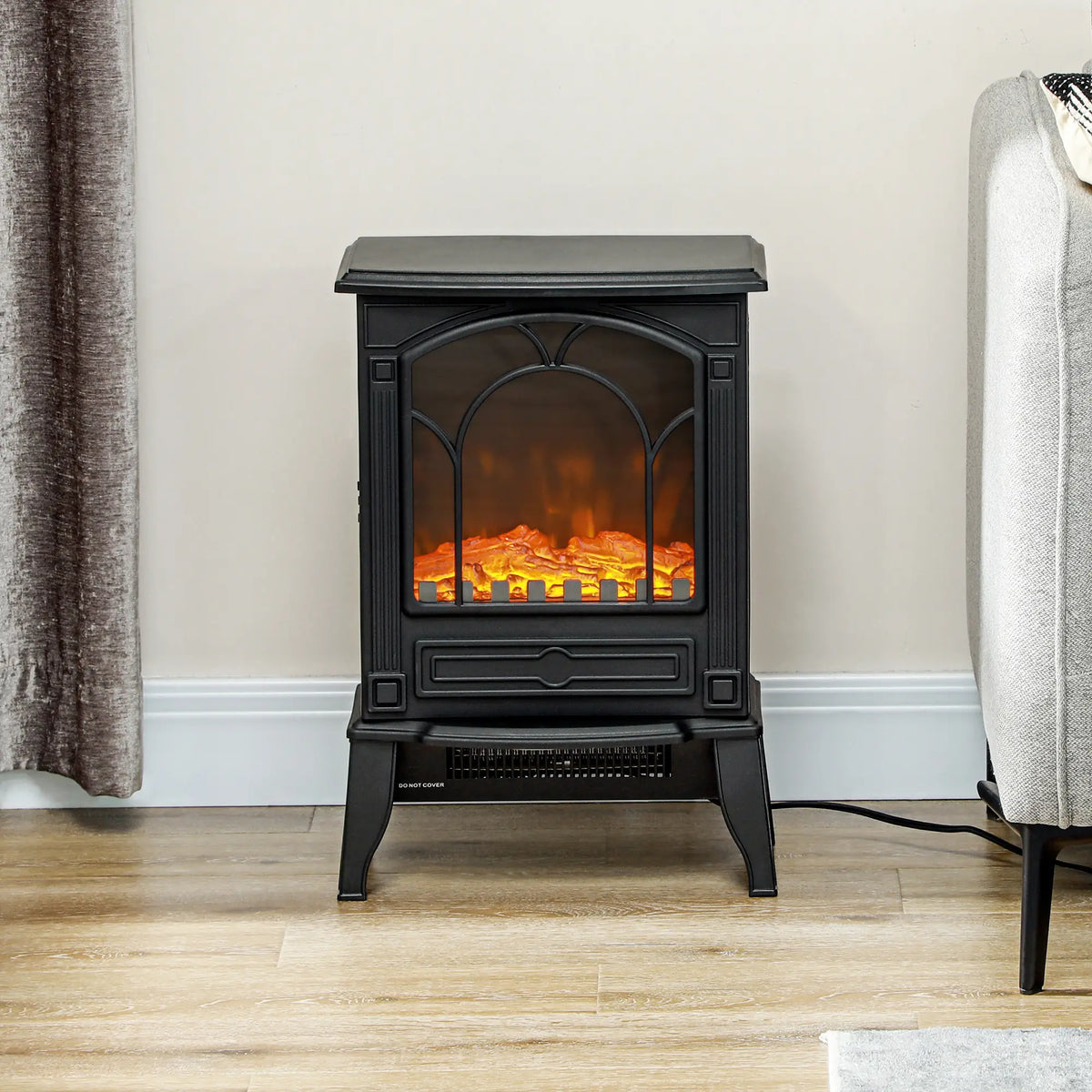 Black HOMCOM electric fireplace stove with 750W/1500W heat settings.